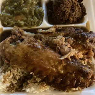 Stuffed turkey wings and rice and gravy with sides of green beans and cornbread dressing $16