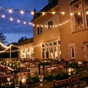 Dinner on the Terrace under twinkling lights.