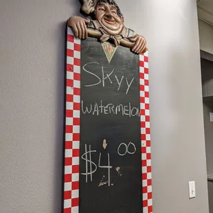 a sign for skyy watermelon