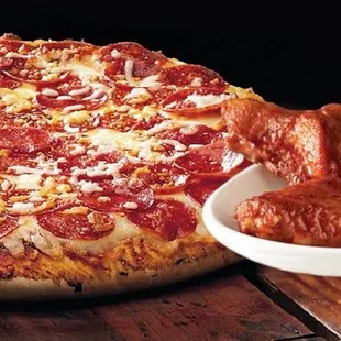 a pizza with pepperoni and cheese