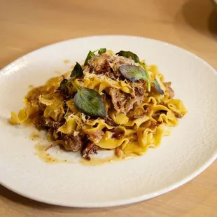 Wild Boar Pappardelle: Slow Braised Wild Boar, Mushroom Marsala, Hazelnut Crème Fresh