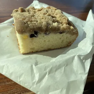 Blueberry coffee cake square.  Two while blueberries in this piece of coffee cake and I&apos;m sorry - that just not cool.