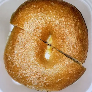 Eggs whites and cheese on a plain bagel