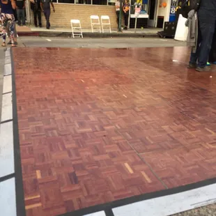 They actually put a dance floor on the street lol