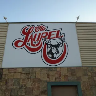 Sign on the north side of the building.