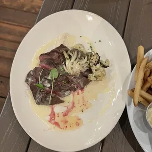 Snake River Farms Wagyu Flank Steak with Cauliflower, Beech Mushroom Conserva, Bone Marrow Butter