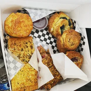 Assorted delights 3 kinds of blueberry raspberry cinnamon oat scones biscuit Streusal rhubarb pie ham cheese picnic hand pie