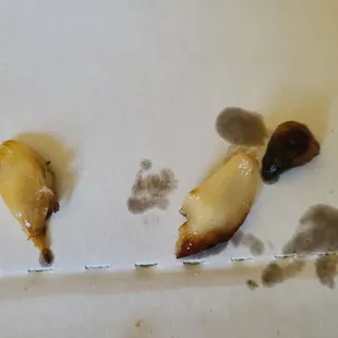 3 of the whole garlic cloves I had to pick off my pizza. There were more too.
