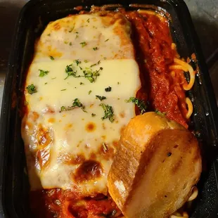 Eggplant Parm to go. Comes with delicious soup and toast.