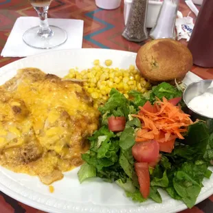 Mexican casserole, corn, green salad, and corn muffin. Delicious!! Great food and service!