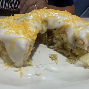 Kansas Tornado  biscuit with egg, sausage, cheese and gravy