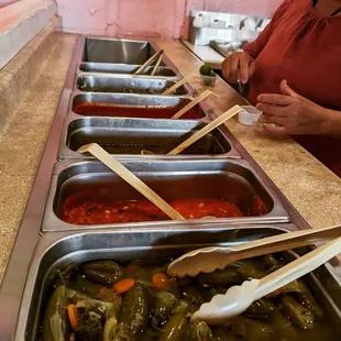a line of food being prepared