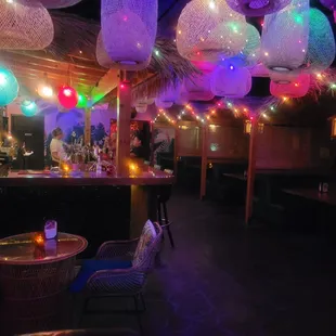 the interior of a tropical bar