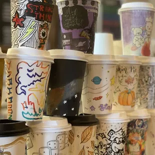 Awesome creative decor, decorate a cup for their display and receive a coupon for a free drink! #somuchtalent