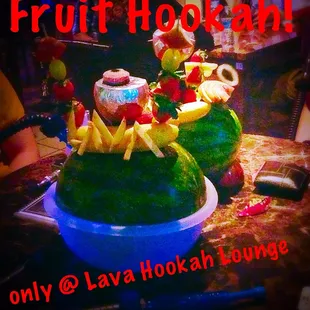 a watermelon decorated with fruit