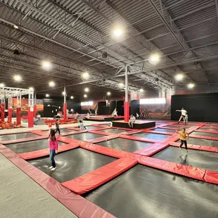 the inside of a trampoline park