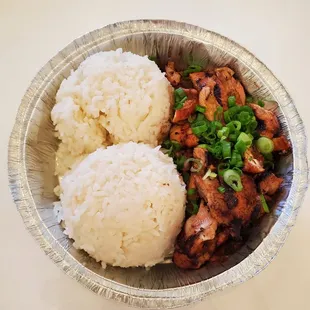 a bowl of rice and chicken