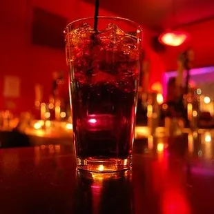 a drink in a glass with a straw