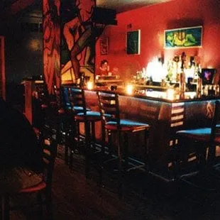 a woman sitting at a bar