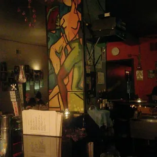 a woman sitting at a bar