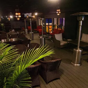 a patio with a lot of furniture