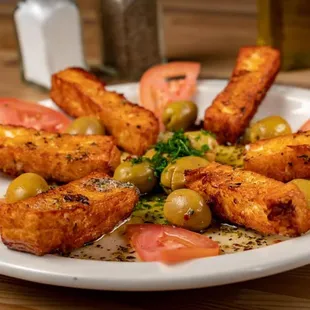a plate of food on a wooden table
