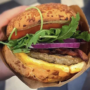 Breakfast Sandwich with arugula onion and tomato