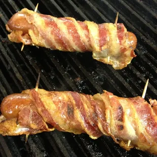 A Sonoma Dog.  Bacon wrapped all beef hot dog, topped with shredded pepper jack cheese, Sriracha mayo, chopped onions and pickled jalapenos