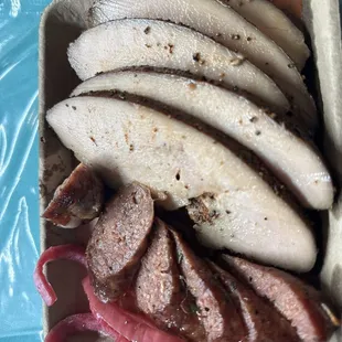 Yummy pit stop on my carnivore diet with spicy sausage and turkey breast.