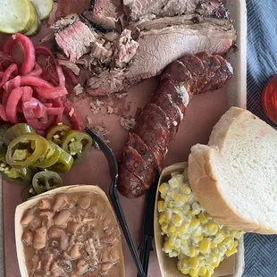 a tray of meat and beans