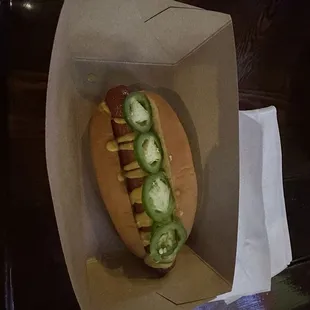 Hot dog w mustard and jalapenos