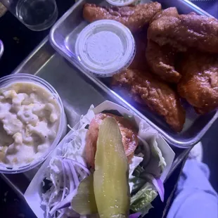 Buffalo chicken tenders plate with side of mac n cheese. Nice surprise with complementary side of coleslaw &amp; pickles
