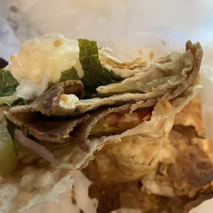 One thin, paltry slice of gyro meat in the wrap is all you get.