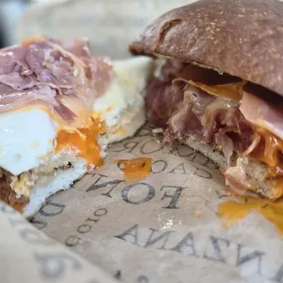 The insides of this delicious Prosciutto Brioche breakfast sandwich.  $15