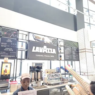 a man and a woman in a coffee shop
