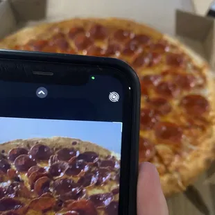 A picture of my daughter taking a picture