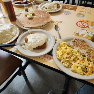 a table full of breakfast foods