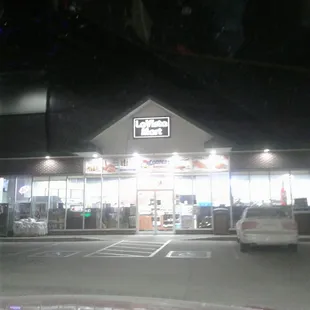 the front of the store at night