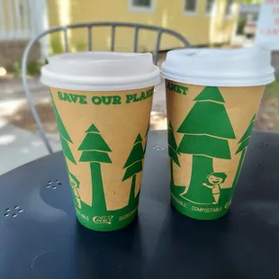 wo coffee cups on a table