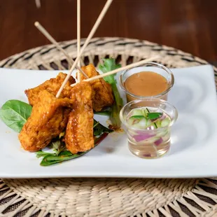 Tofu Satay with peanut sauce and cucumber salad