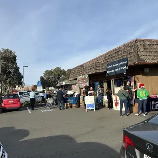 a parking lot full of people