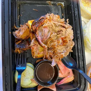 a plate of meat and vegetables