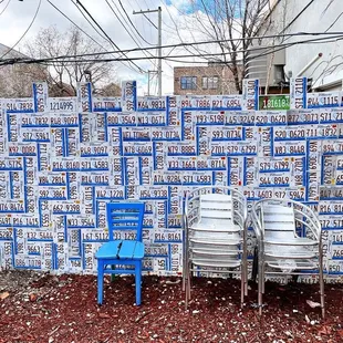 The Illinois Plate wall was made with plates from the former used car lot next door.