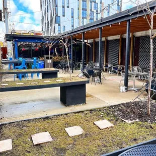 Outdoor patio is fantastic even with green grass table tops.