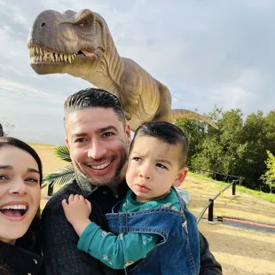 Terrified toddler of moving and roaring dinos