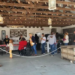 a group of people standing in a building