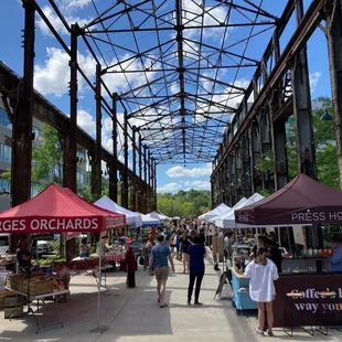 people walking through the market