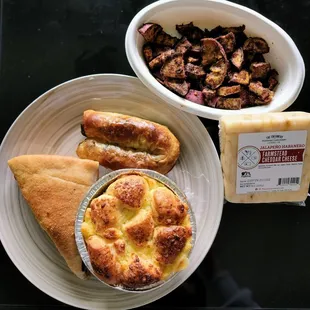 a plate of food and a bowl of mushrooms