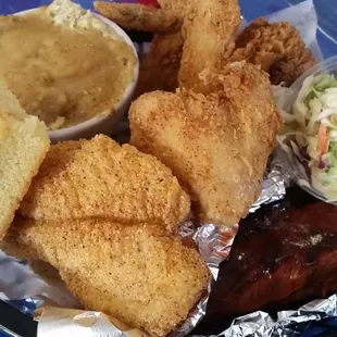 2 Ribs, 4 Wings, 1 Catfish, Cole Slaw, Mashed Potatoes and Cornbread - all for $11.95. You can&apos;t beat that price.