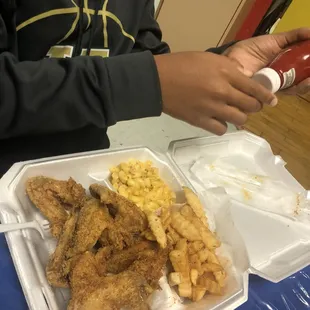 Wings with fries and mac and cheese
